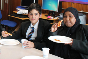  Students enjoying pizza