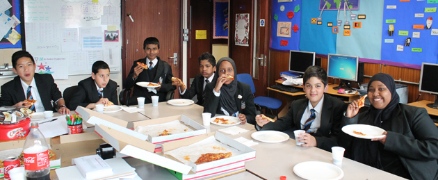  Students enjoying their pizza party