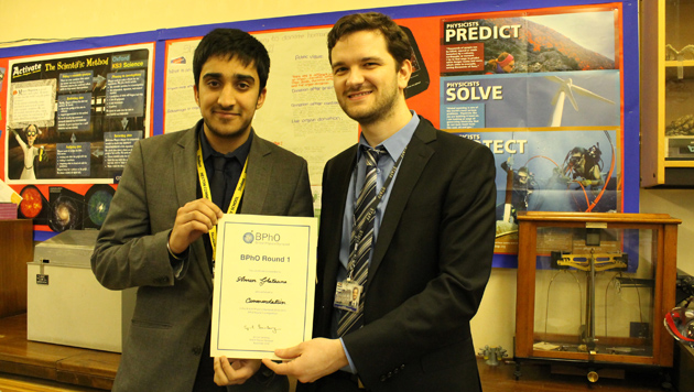 Aman being presented with his certificate by Mr Newton