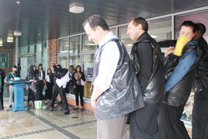  Students throwing wet sponges at teachers