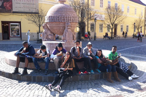  Students in front of Sculpture in Hungary having Ice Creams