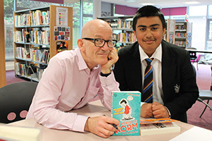  Jonathan signing one of his books