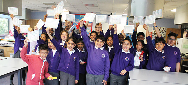  Heston primary students with their certificates after making pizzas