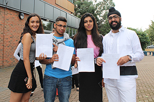  Students proudly show off their GCSE grades