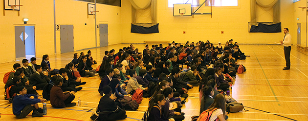  Mr Williams welcoming new students in the Sports Hall