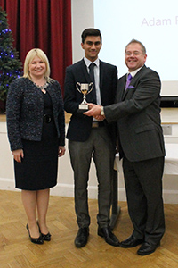  Samantha Coggins- Thompson & Phil Ward present Adam Patel with his student of the year award