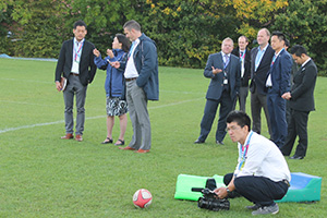  Japanese visitors watching rugby training