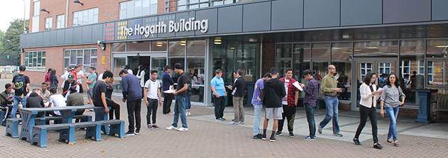  Students after collecting their GCSE results outside The Hogarth Building