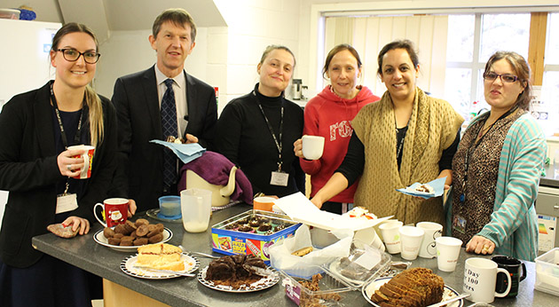  Staff enjoying the Bake Off Cakes