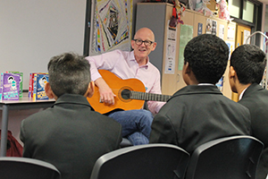  Jonathan playing guitar & singing a song about Norm