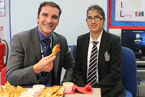  Assistant Headteacher Mr Regnier enjoying Brahmleen's samosas