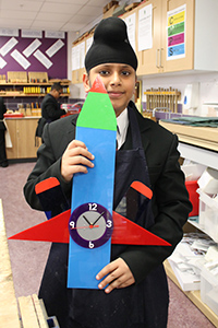 Year 7 student with his rocket clock