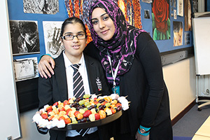  Brahmleen & her Fruit kebabs with Asma one of her Teaching Assistants