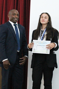 Bethany receiving her award from Mr McGarrell