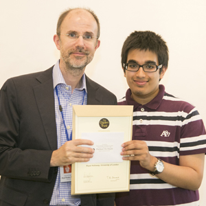  Kumail receiving award from Royal Holloway Physicist