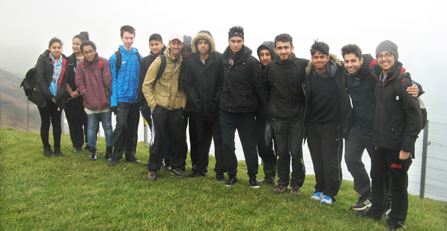  Geography students on a cliff top