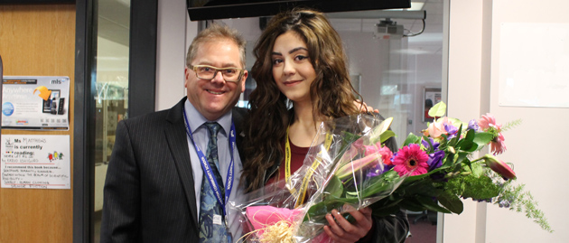  Headteacher Mr Ward presenting flowers to Sombol