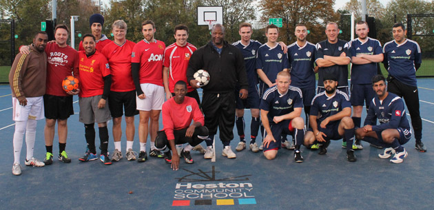  Staf and Police teams before the match