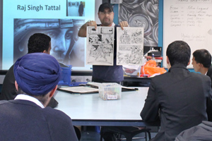  Raj presents his work to students