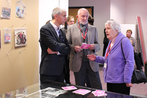  Ian Thompson with Heston Residents Association visitors to the Archive
