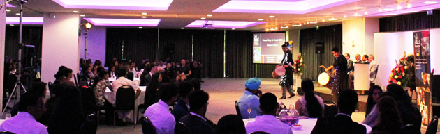  Dhol Drummers in "coat of lights" and audience