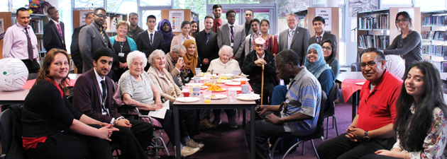  Visitors students and teachers enjoying refreshements