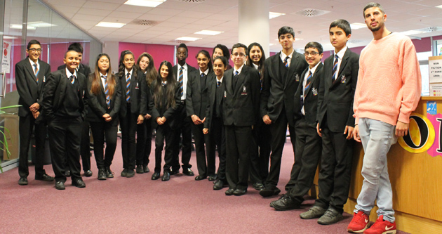  Anthony with students in the LRC