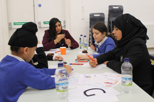  Year 7 students working on maths problems with Westbrook students