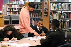  Anthony working with students