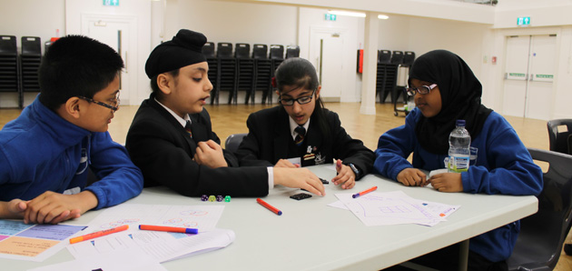  Year 7 students working with Wesrtbrook's Year 6 students