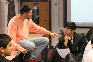  Anthony working with students