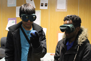  Students wering "upside down" goggles